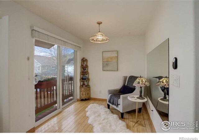 1460 Quince Ave Unit S102, Boulder, CO 80304 - living area with wood finished floors and baseboards