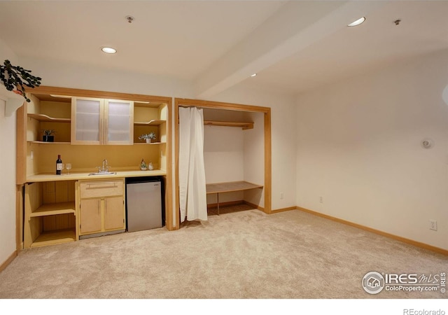 1460 Quince Ave Unit S102, Boulder, CO 80304 - kitchen with open shelves, refrigerator, light carpet, a sink, and recessed lighting