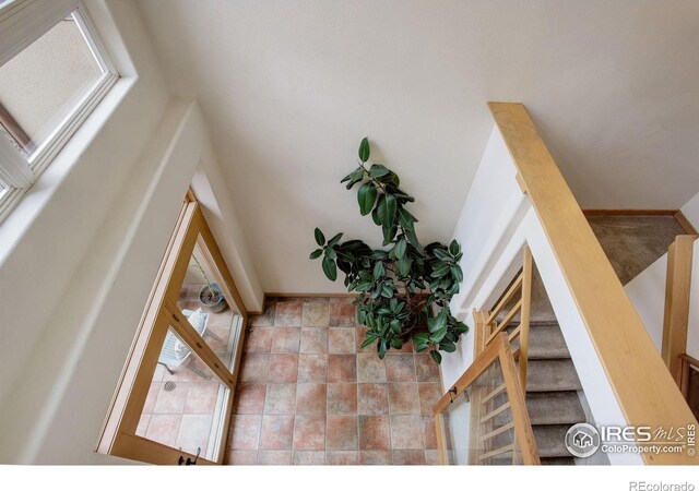 1460 Quince Ave Unit S102, Boulder, CO 80304 - stairs featuring plenty of natural light and stone finish flooring