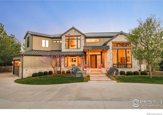 2158 Tamarack Ave, Boulder, CO 80304 - view of front of property featuring a standing seam roof, covered porch, metal roof, and stone siding