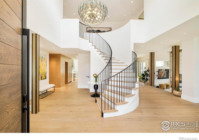 2158 Tamarack Ave, Boulder, CO 80304 - foyer featuring a high ceiling, light wood-style floors, stairs, recessed lighting, and baseboards