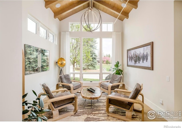2158 Tamarack Ave, Boulder, CO 80304 - living area featuring wood ceiling, a healthy amount of sunlight, high vaulted ceiling, and beamed ceiling