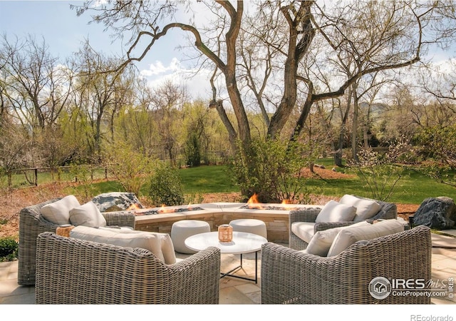 2158 Tamarack Ave, Boulder, CO 80304 - view of patio featuring an outdoor living space with a fire pit and fence