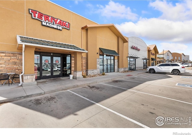 4355 24th Street Rd Unit 202, Greeley, CO 80634 - view of property with uncovered parking