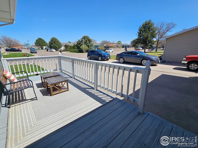 1628 Pheasant Rdg, Sterling, CO 80751 - wooden deck with a porch