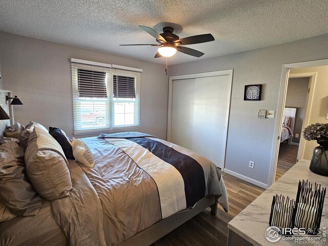 1628 Pheasant Rdg, Sterling, CO 80751 - bedroom with a ceiling fan, a textured ceiling, dark wood finished floors, and a closet