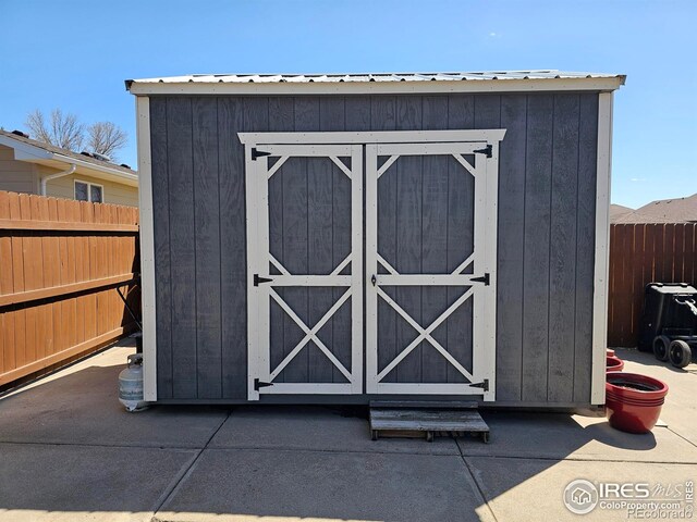 1628 Pheasant Rdg, Sterling, CO 80751 - view of shed featuring fence