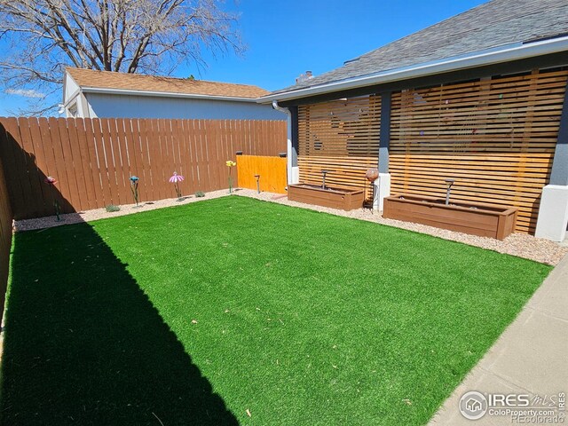 1628 Pheasant Rdg, Sterling, CO 80751 - view of yard with a fenced backyard