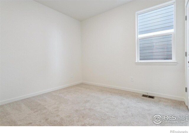 6500 13th St, Frederick, CO 80530 - carpeted spare room with baseboards