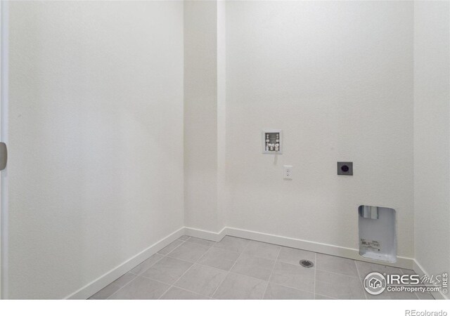 6500 13th St, Frederick, CO 80530 - laundry room featuring baseboards, washer hookup, and electric dryer hookup