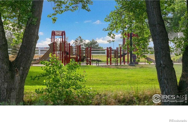 6500 13th St, Frederick, CO 80530 - community jungle gym with a yard