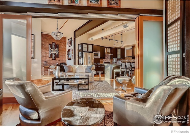 210 W Magnolia St Unit 320, Fort Collins, CO 80521 - living area featuring wood finished floors