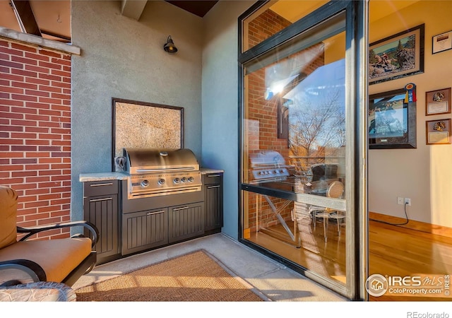 210 W Magnolia St Unit 320, Fort Collins, CO 80521 - exterior space featuring brick wall