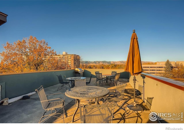 210 W Magnolia St Unit 320, Fort Collins, CO 80521 - view of patio / terrace featuring outdoor dining area
