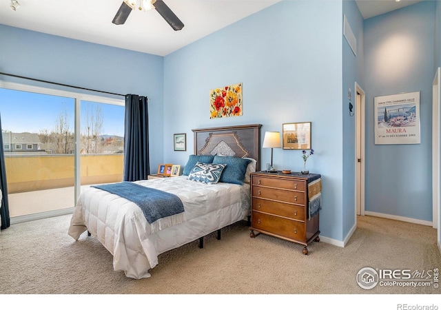 156 Brass Ct Unit 156, Loveland, CO 80537 - carpeted bedroom with a ceiling fan, baseboards, and access to exterior