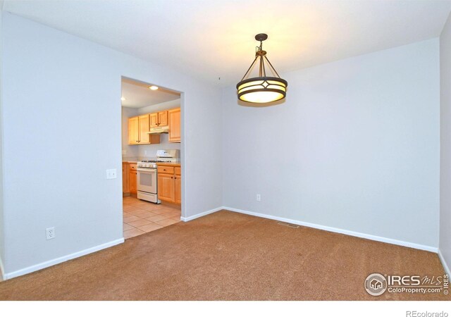 2203 Copper Creek Dr Unit D, Fort Collins, CO 80528 - empty room featuring baseboards, light carpet, and visible vents