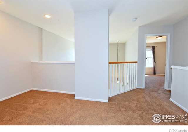 2203 Copper Creek Dr Unit D, Fort Collins, CO 80528 - carpeted empty room with baseboards and recessed lighting
