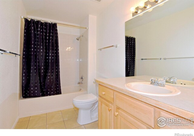 2203 Copper Creek Dr Unit D, Fort Collins, CO 80528 - bathroom with vanity, tile patterned flooring, toilet, and shower / bathtub combination with curtain