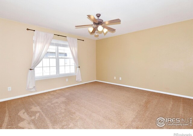 2203 Copper Creek Dr Unit D, Fort Collins, CO 80528 - carpeted spare room featuring a ceiling fan and baseboards