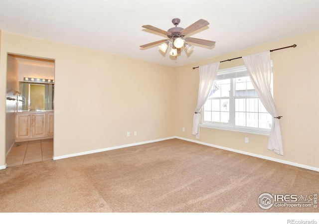 2203 Copper Creek Dr Unit D, Fort Collins, CO 80528 - empty room with baseboards, a ceiling fan, and carpet