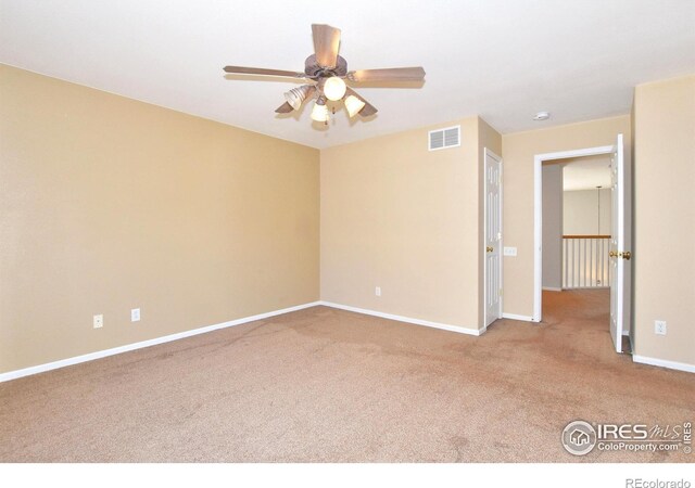 2203 Copper Creek Dr Unit D, Fort Collins, CO 80528 - interior space featuring baseboards, visible vents, ceiling fan, and carpet