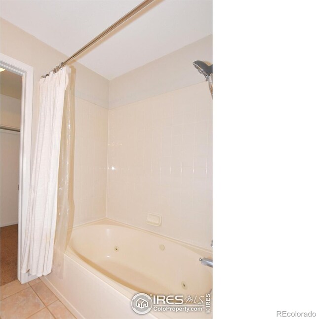 2203 Copper Creek Dr Unit D, Fort Collins, CO 80528 - bathroom with tile patterned floors and shower / bath combination with curtain