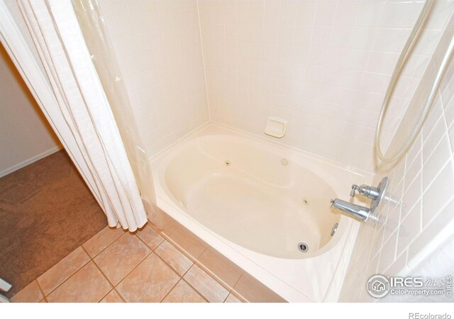 2203 Copper Creek Dr Unit D, Fort Collins, CO 80528 - bathroom with tile patterned flooring and a combined bath / shower with jetted tub