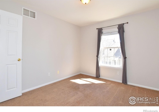 2203 Copper Creek Dr Unit D, Fort Collins, CO 80528 - carpeted spare room featuring visible vents and baseboards