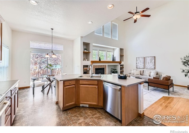 1602 Prairie Song Pl, Longmont, CO 80504 - kitchen with light countertops, open floor plan, a sink, and dishwasher