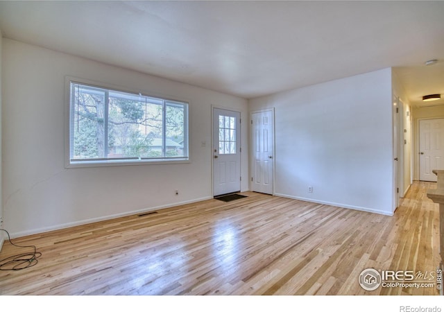 810 34th St, Boulder, CO 80303 - spare room with baseboards, visible vents, and wood finished floors