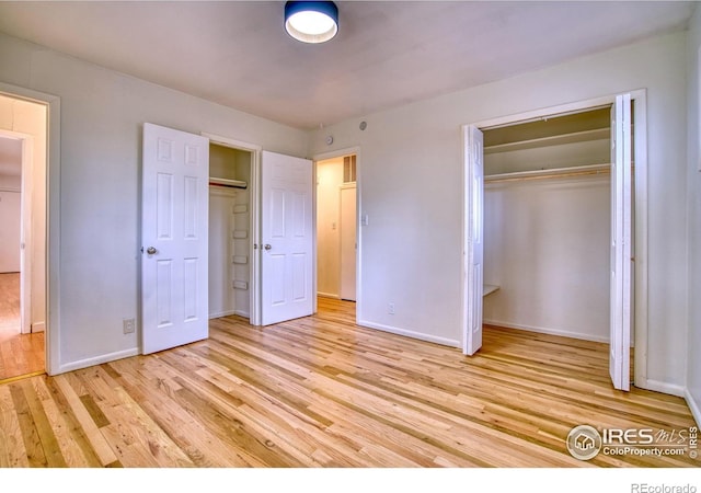 810 34th St, Boulder, CO 80303 - unfurnished bedroom featuring baseboards, a closet, and light wood-type flooring