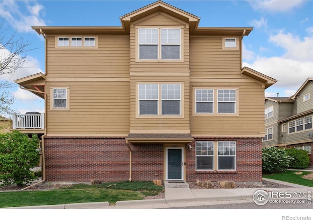 12820 King St, Broomfield, CO 80020 - traditional-style house featuring brick siding