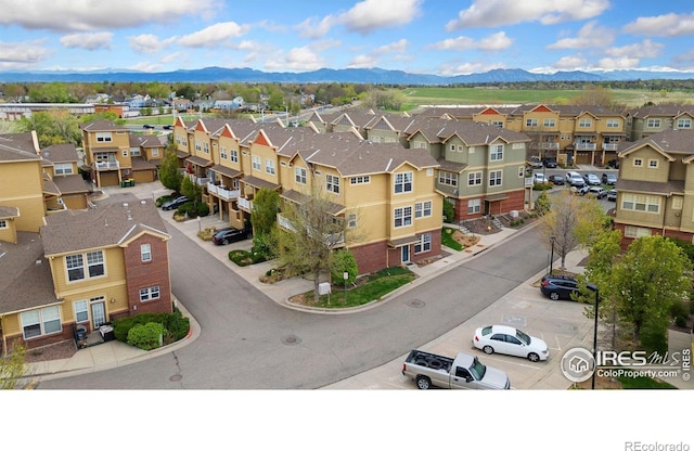 12820 King St, Broomfield, CO 80020 - aerial view of residential area featuring a mountainous background