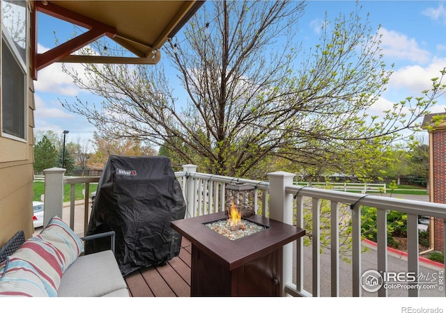 12820 King St, Broomfield, CO 80020 - deck featuring an outdoor fire pit