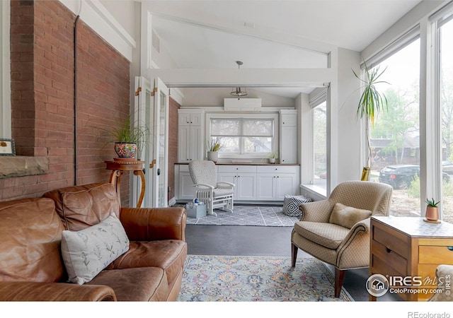 845 14th St, Boulder, CO 80302 - living room with visible vents, lofted ceiling, and finished concrete flooring
