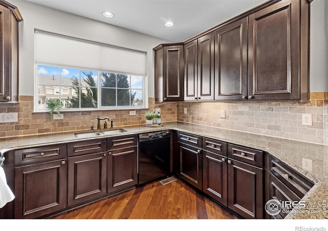 4822 Raven Run, Broomfield, CO 80023 - kitchen with a sink, dark wood finished floors, black dishwasher, and dark brown cabinetry