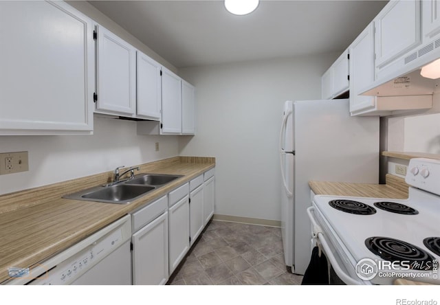 kitchen with a sink, white appliances, light countertops, premium range hood, and white cabinetry