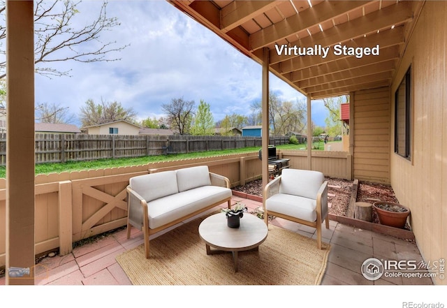 view of patio / terrace with a fenced backyard and outdoor lounge area