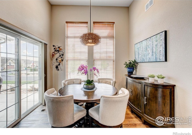 14394 W 88th Dr Unit C, Arvada, CO 80005 - dining area with light wood-type flooring and visible vents