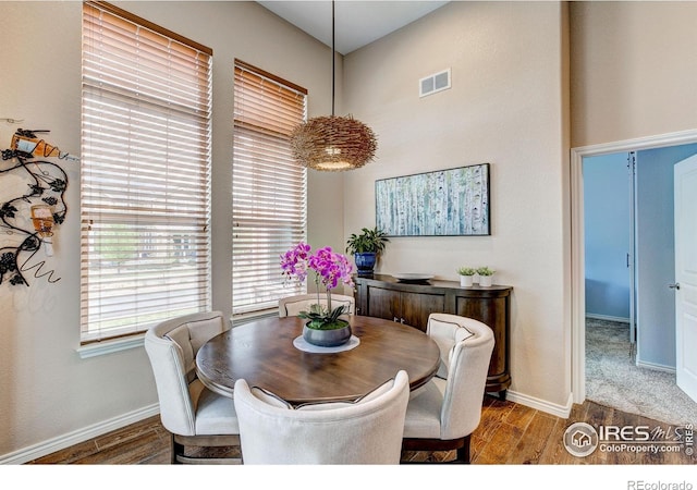 14394 W 88th Dr Unit C, Arvada, CO 80005 - dining area featuring wood finished floors and baseboards