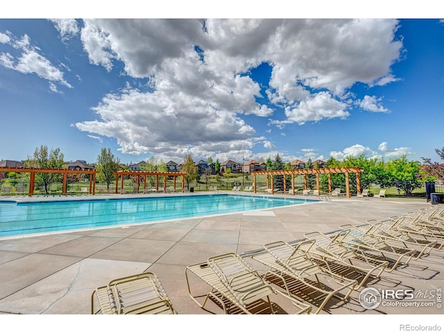 14394 W 88th Dr Unit C, Arvada, CO 80005 - community pool with fence, a pergola, and a patio area