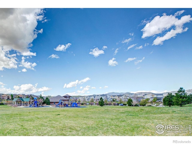 14394 W 88th Dr Unit C, Arvada, CO 80005 - view of yard featuring a residential view and playground community