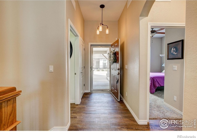 14394 W 88th Dr Unit C, Arvada, CO 80005 - entryway featuring dark wood-type flooring, arched walkways, and ceiling fan
