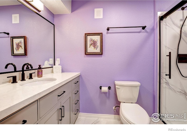 14394 W 88th Dr Unit C, Arvada, CO 80005 - bathroom featuring vanity, a marble finish shower, and marble look tiles