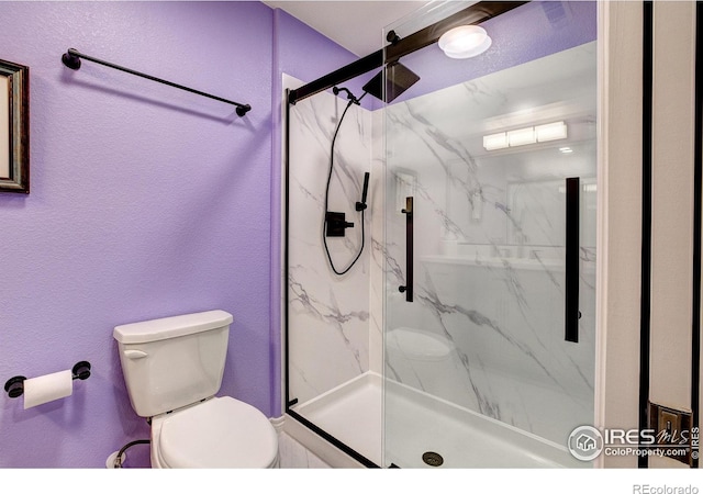 14394 W 88th Dr Unit C, Arvada, CO 80005 - bathroom with a marble finish shower and a textured wall