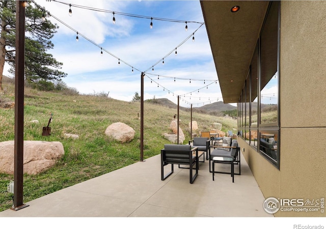 451 Red Gulch Rd, Lyons, CO 80540 - view of patio / terrace with an outdoor hangout area