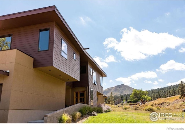 451 Red Gulch Rd, Lyons, CO 80540 - view of side of property featuring a yard and a mountain view