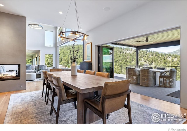 50 Wildwood Ln, Boulder, CO 80304 - dining space featuring wood finished floors, a chandelier, and recessed lighting