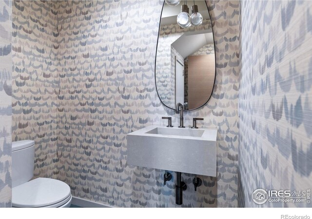 50 Wildwood Ln, Boulder, CO 80304 - bathroom with toilet and a sink