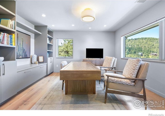 50 Wildwood Ln, Boulder, CO 80304 - home office with light wood-type flooring and recessed lighting